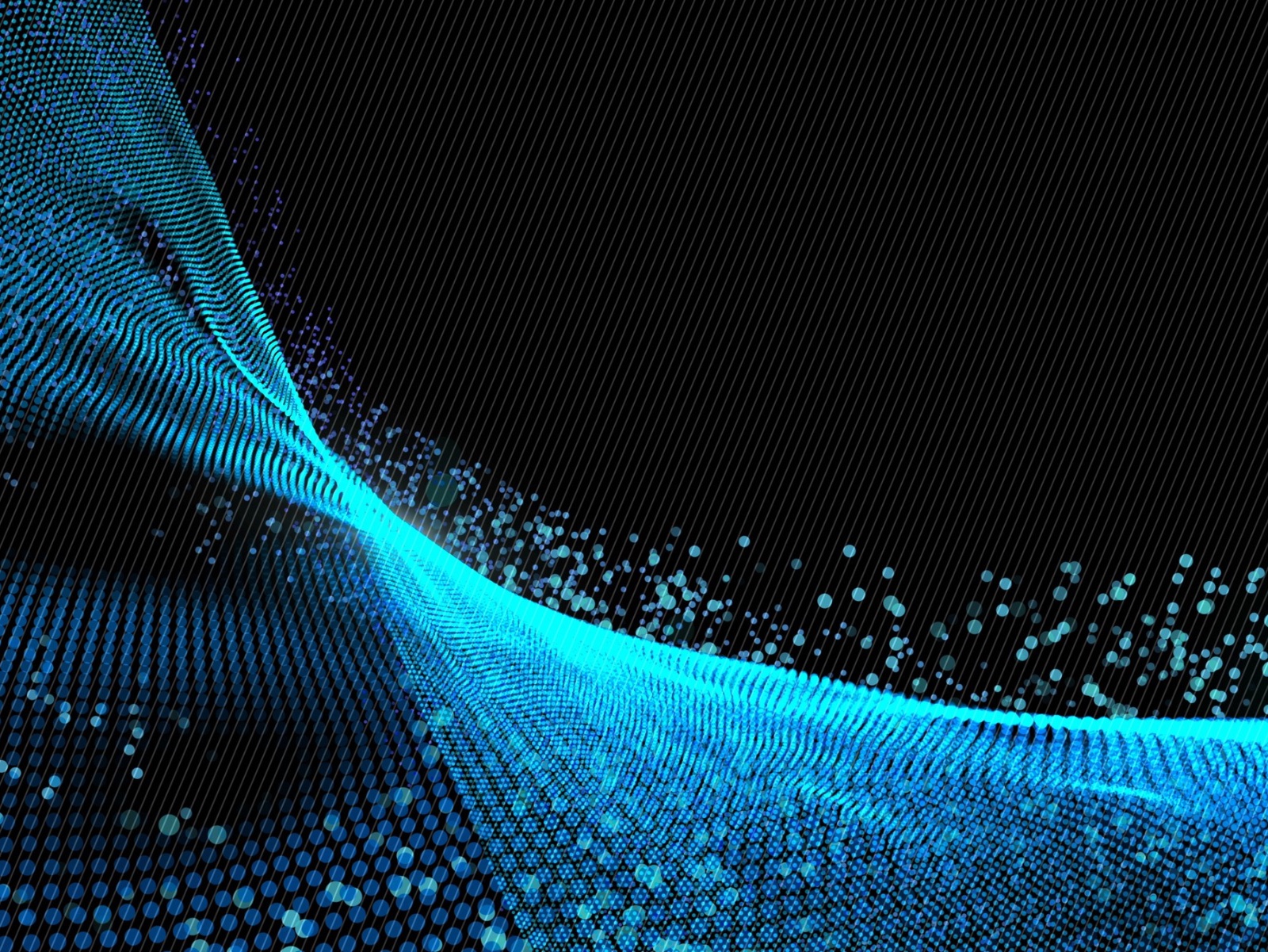 Woman standing on stage holding microphone.